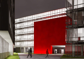 widok na wnętrze budynków biurowych z czerwonym boksem wejściowym wg projektu wrocławskich architektów